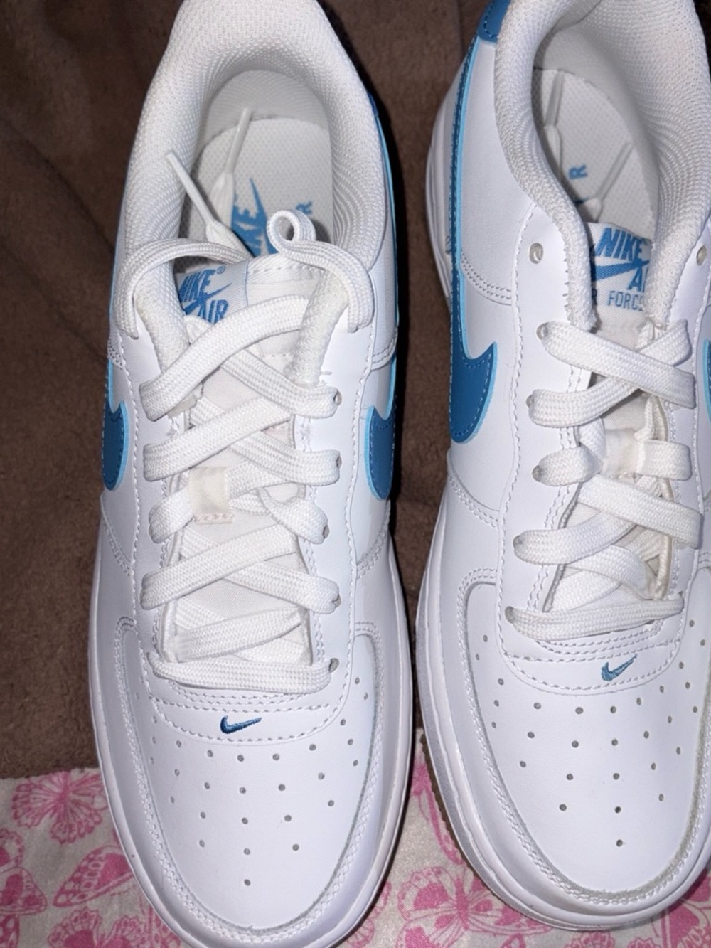 Nike White Sneakers with Blue Swoosh